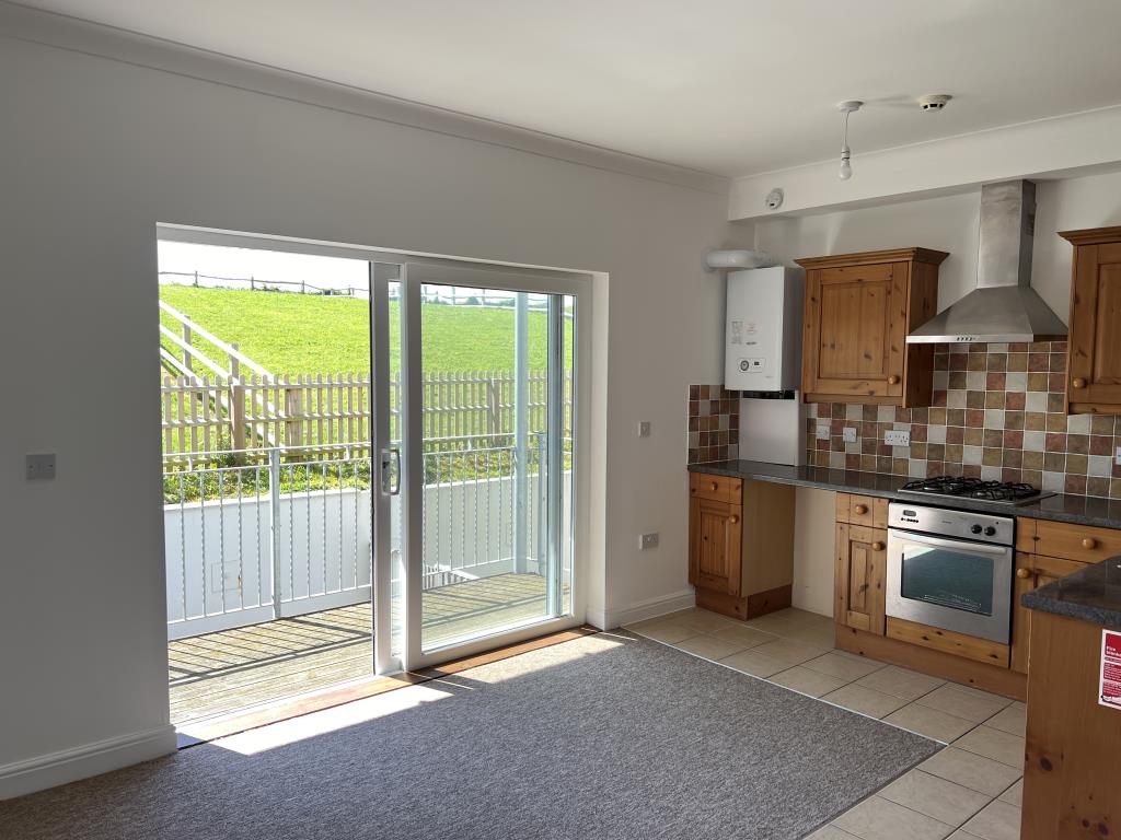 Lot: 6 - TWO-BEDROOM FLAT FOR INVESTMENT OR OCCUPATION - View of the patio doors leading to balcony